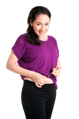 woman giving herself an hcg injection